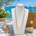 Collana tre fili lunga con stelle marine