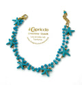 Bracciale azzurro doppio giro con stelle marine e cristalli