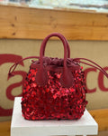 Borsa a mano in ecopelle e e pagliette rosse