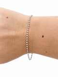 Bracciale in Argento 925 con catena a pallini sfaccettati, indossato al polso