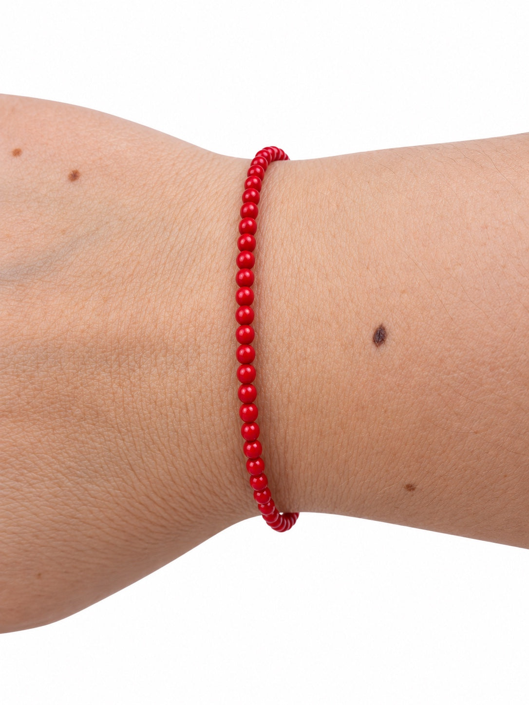 Bracciale boule mini in corallo di bambù e Argento 925 indossato al polso