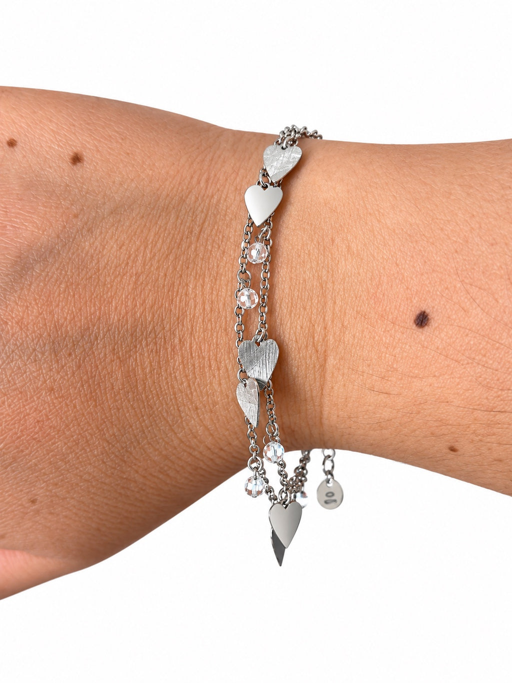 Bracciale doppio con cuori martellati e lisci e punti luce in Argento 925 indossato