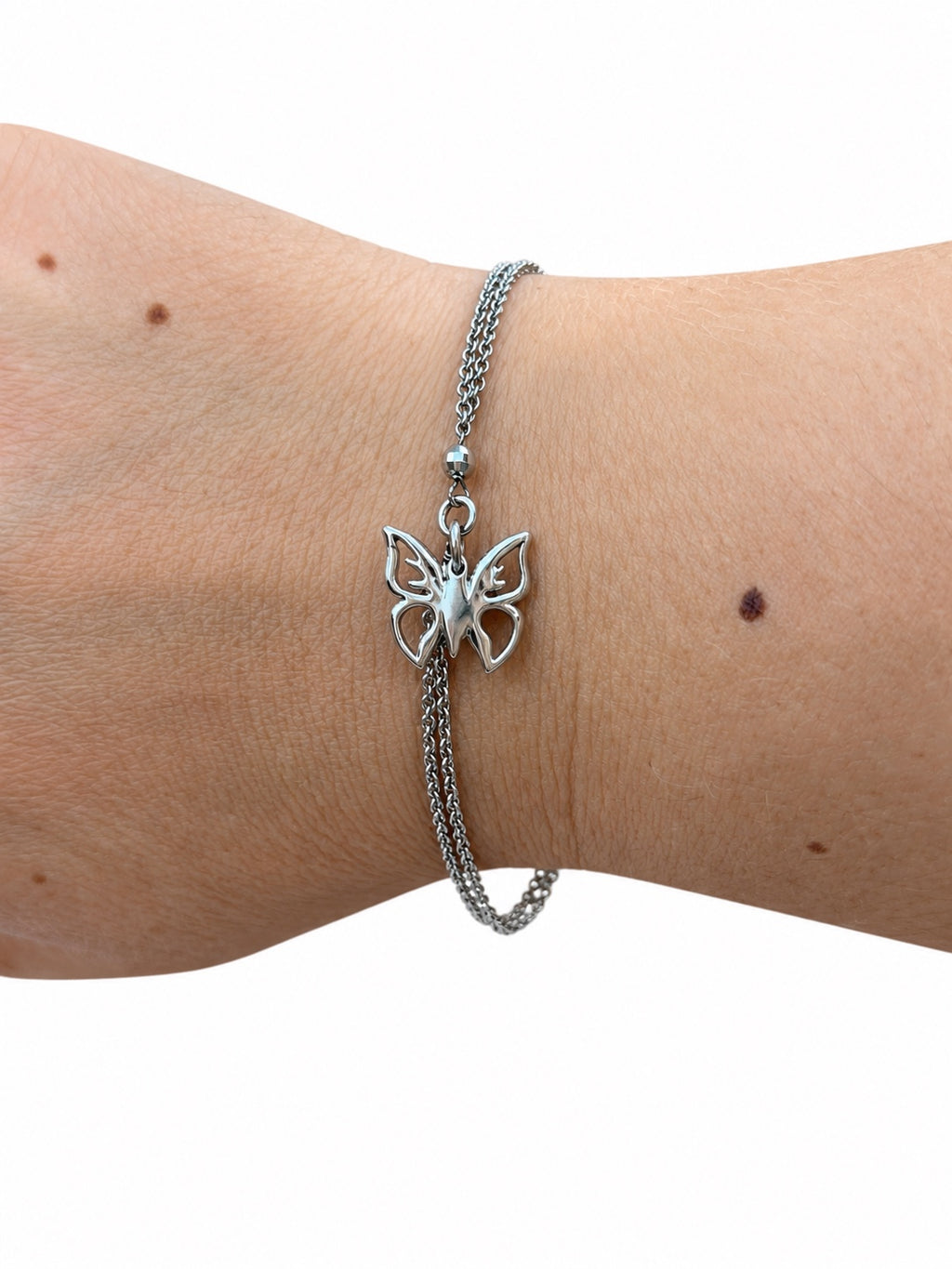 Bracciale con ciondolo farfalla in Argento 925 indossato al polso