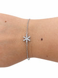 Bracciale in Argento 925 con fiocco di neve centrale e zirconi, indossato al polso
