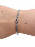 Bracciale nodo d’amore in Argento 925 indossato al polso