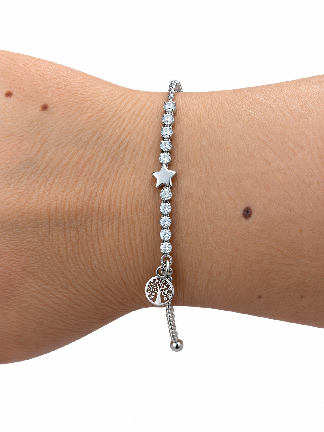 Bracciale catena e tennis centrale con stella e albero della vita in Argento 925 indossato al polso